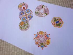 Embroidered Nagoya obi of Takarazukushi* pattern   